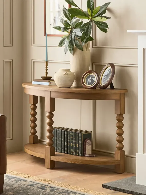 9 Demi-Lune Tables for That Awkward Spot You’ve Never Known How to Fill