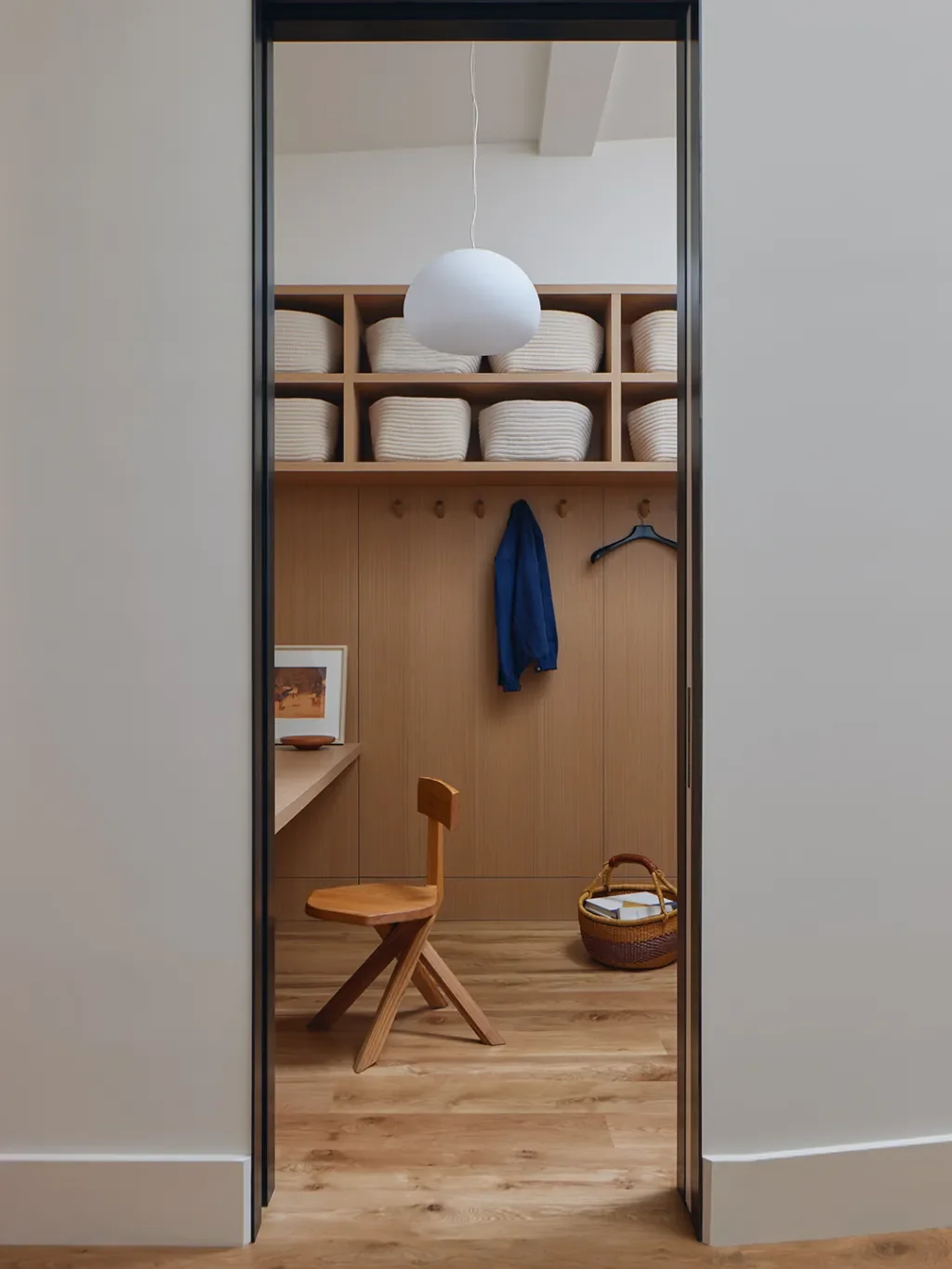 How a Designer Made a Murphy Bed in a 7×11 Room Look Like Built-Ins