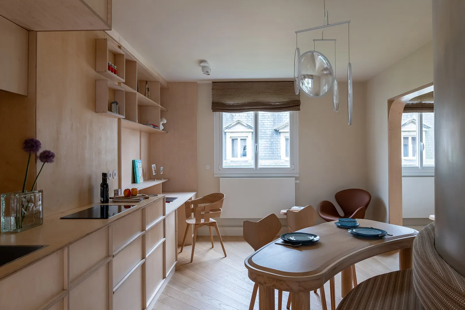 How a Paris Designer Turned an Awkward Curved Wall Into a Clever Kitchen Layout - 2