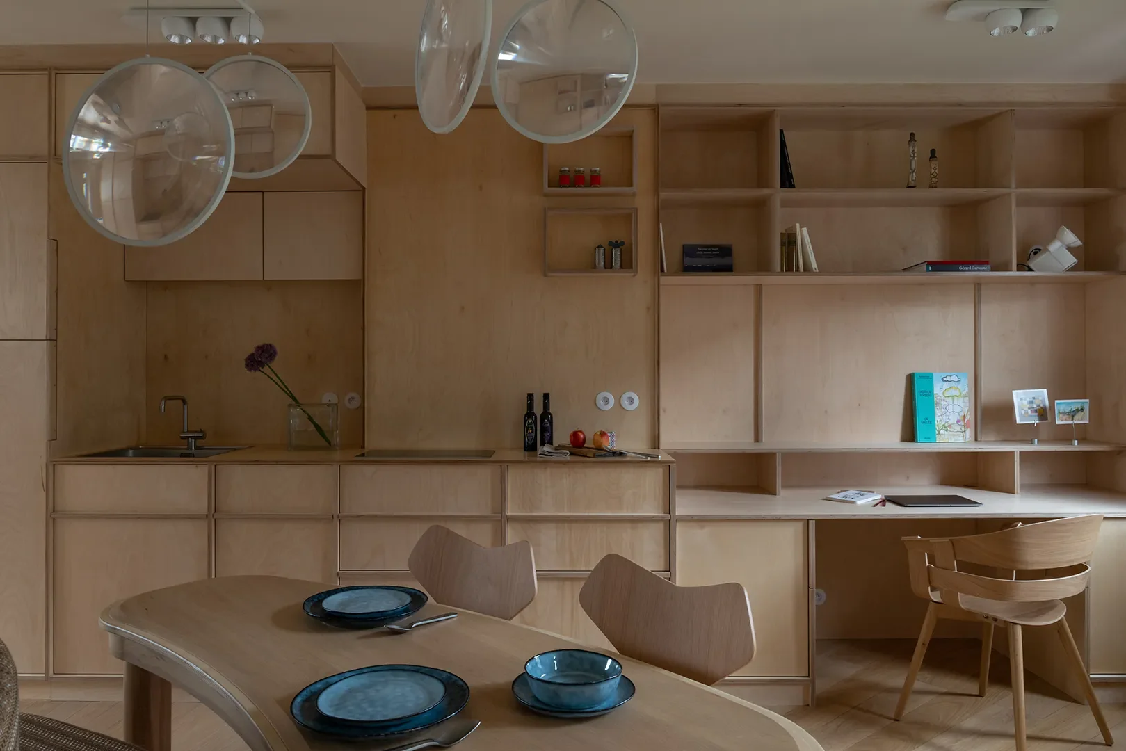 How a Paris Designer Turned an Awkward Curved Wall Into a Clever Kitchen Layout - 3
