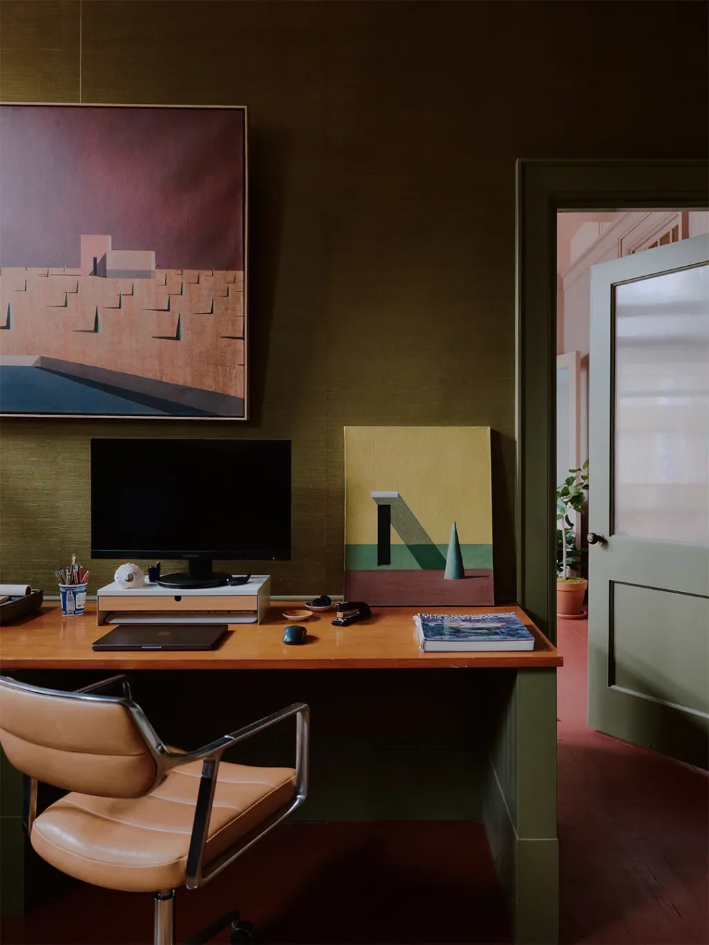 Mismatched Doorknobs and Crimson Floors Give This Design Studio Its Layered, Collected Soul