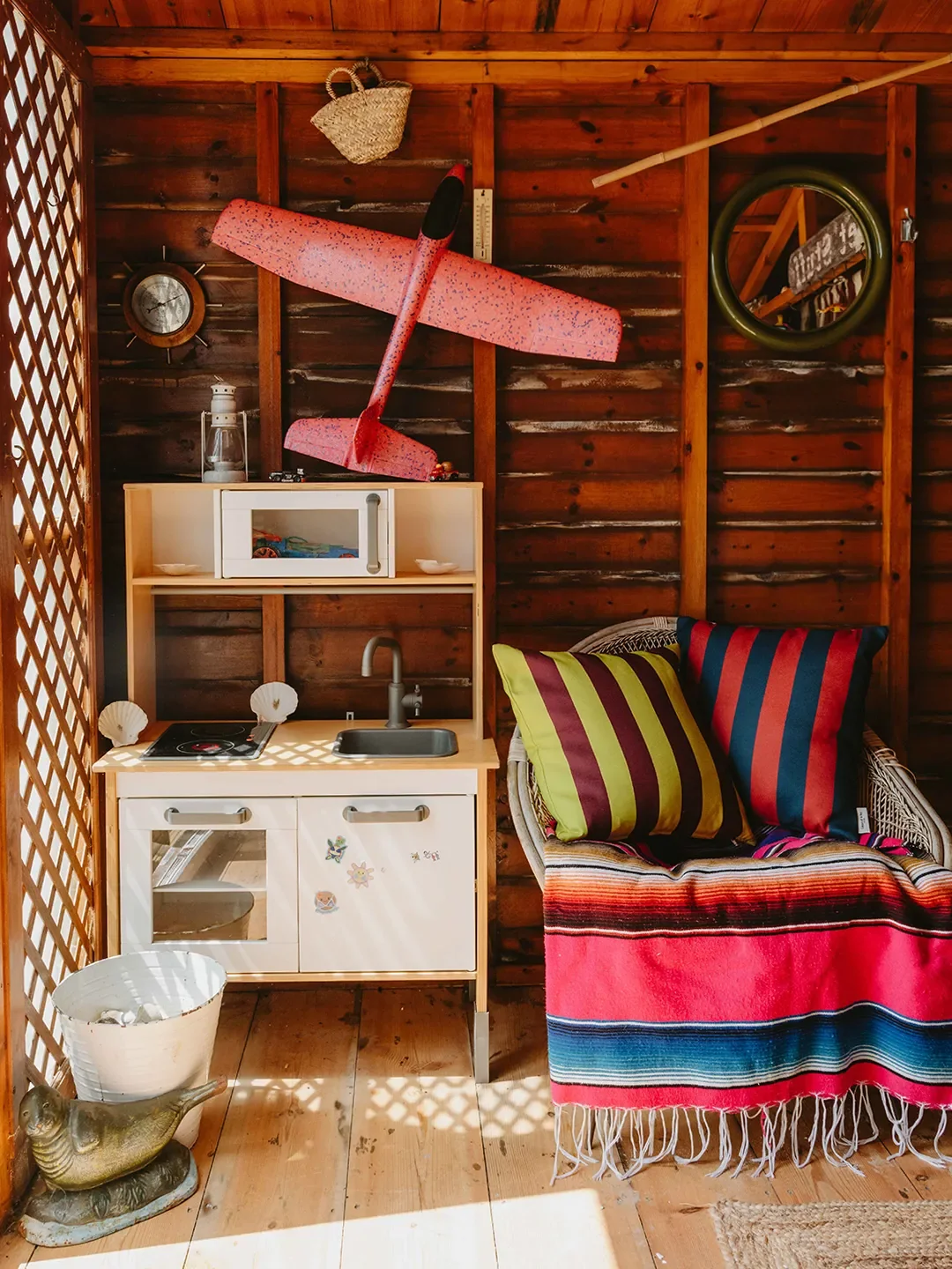 A Tiny British Beach Hut in Stripes on Stripes—Subtly Nautical, Never Obvious - 5