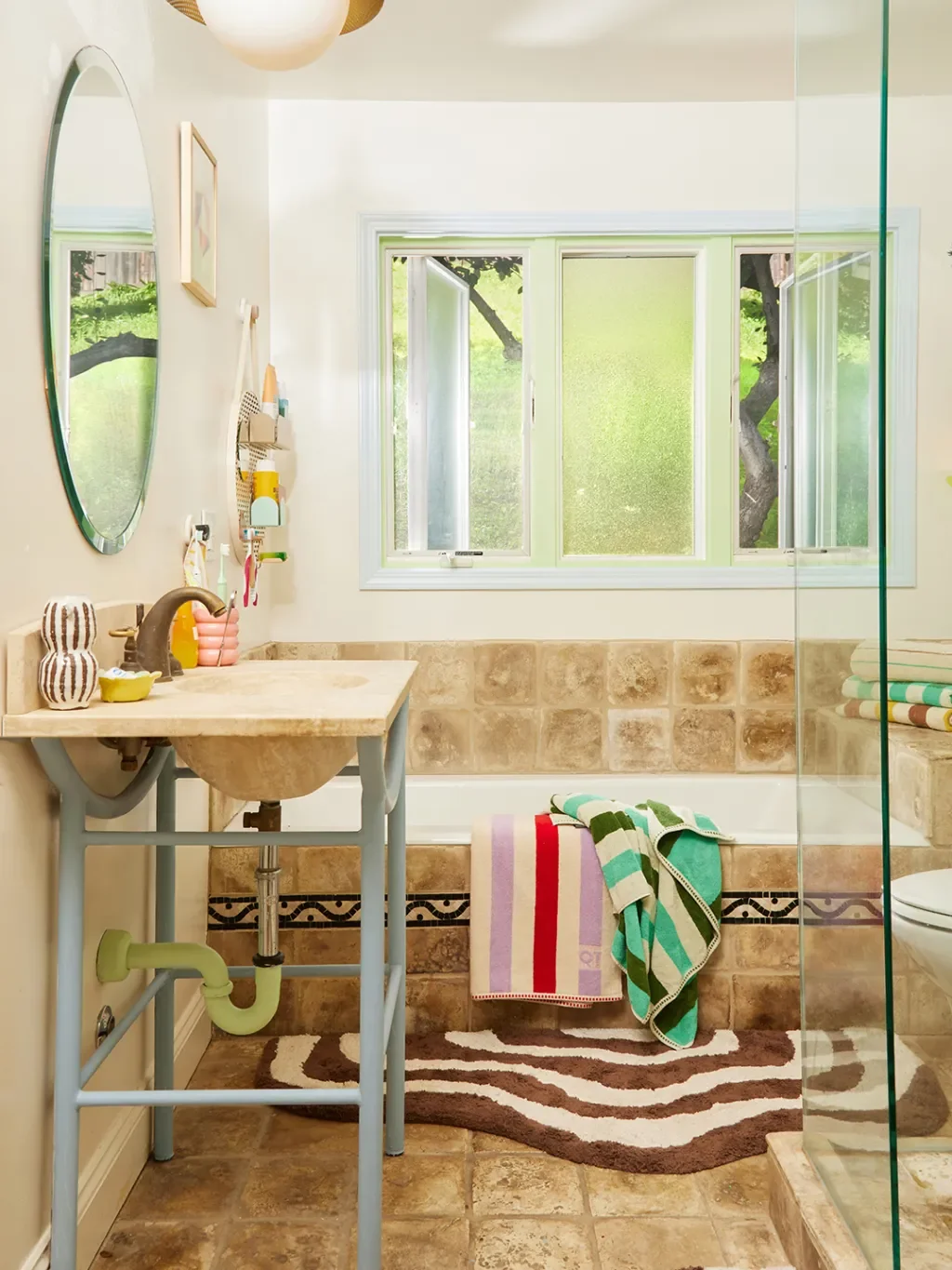 When You Can’t Conceal Ugly Bathroom Plumbing, Paint It Instead